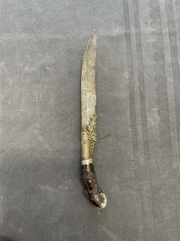 A varied collection of four decorated daggers, two inset with red coral and turquoise, Sri Lanka and Georgia, 18/19th C.