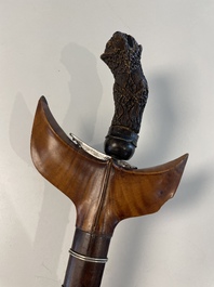 A collection of six krises with carved handles, four with scabbard, Indonesia, 19th C.