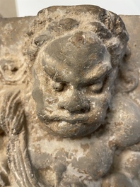 A Chinese architectural pottery tile of a 'non-Han' figure, Song/Jin
