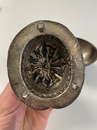 A varied collection of Chinese and Japanese eating set trousses, a Tibetan 'kapala' and two daggers, 18/19th C.