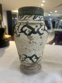 An early Islamic pottery albarello with engraved copper mount and cover, probably Nishapur, Iran, 10/11th C.