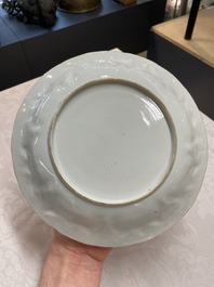 A pair of Chinese iron-red saucers and two plates, Kangxi/Yongzheng