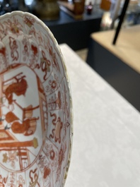 A pair of Chinese iron-red saucers and two plates, Kangxi/Yongzheng