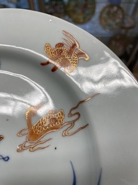Six Chinese blue and white 'floral' bowls, a pair of dishes, a saucer and an iron-red-decorated plate, Qianlong