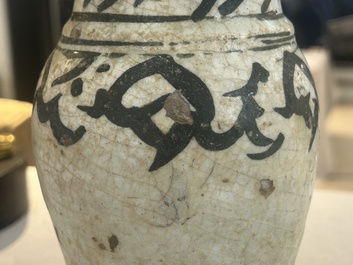 An early Islamic pottery albarello with engraved copper mount and cover, probably Nishapur, Iran, 10/11th C.