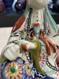 A Chinese famille rose Guanyin and a celadon-glazed dish, Chenghua mark, Qianlong/Jiaqing