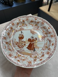 A pair of Chinese iron-red saucers and two plates, Kangxi/Yongzheng