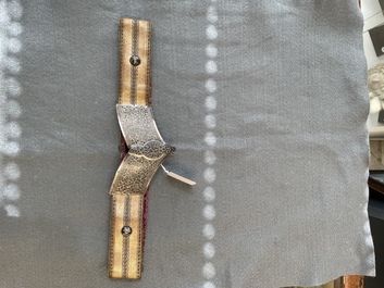 A gold lame woman's belt, a breast ornament and a silver karwat, Caucasus and Afghanistan, 19th C.