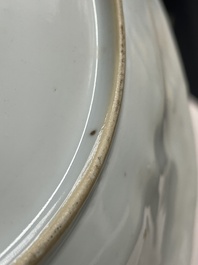 A pair of Chinese iron-red saucers and two plates, Kangxi/Yongzheng
