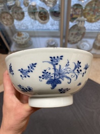 Six Chinese blue and white 'floral' bowls, a pair of dishes, a saucer and an iron-red-decorated plate, Qianlong