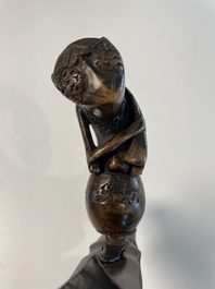 A collection of six krises with carved handles, four with scabbard, Indonesia, 19th C.