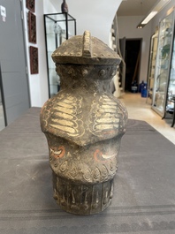 A Chinese painted terracotta owl-shaped 'zun' wine vessel, Han