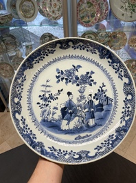 Six Chinese blue and white 'floral' bowls, a pair of dishes, a saucer and an iron-red-decorated plate, Qianlong