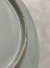 A pair of Chinese iron-red saucers and two plates, Kangxi/Yongzheng