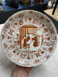A pair of Chinese iron-red saucers and two plates, Kangxi/Yongzheng