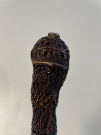 A collection of six krises with carved handles, four with scabbard, Indonesia, 19th C.