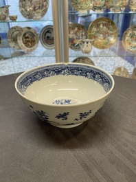 Six Chinese blue and white 'floral' bowls, a pair of dishes, a saucer and an iron-red-decorated plate, Qianlong