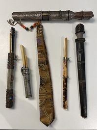 A varied collection of Chinese and Japanese eating set trousses, a Tibetan 'kapala' and two daggers, 18/19th C.