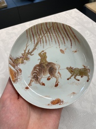 A pair of Chinese iron-red saucers and two plates, Kangxi/Yongzheng