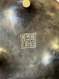 A Chinese bronze two-handled tripod censer, Ding 鼎 mark, Yuan/Ming