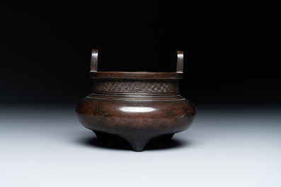 A Chinese bronze two-handled tripod censer, Ding 鼎 mark, Yuan/Ming
