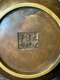 A Chinese bronze censer with lion-form handles, Xuande mark, 17/18th C.