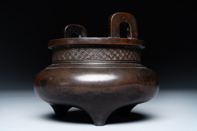 A Chinese bronze two-handled tripod censer, Ding 鼎 mark, Yuan/Ming