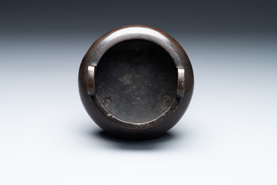 A Chinese bronze two-handled tripod censer, Ding 鼎 mark, Yuan/Ming