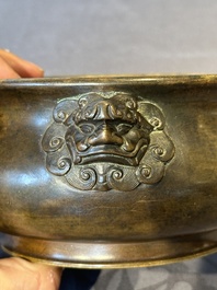 A Chinese bronze censer with lion-form handles, Xuande mark, 17/18th C.