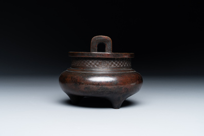 A Chinese bronze two-handled tripod censer, Ding 鼎 mark, Yuan/Ming
