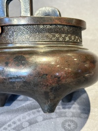 A Chinese bronze two-handled tripod censer, Ding 鼎 mark, Yuan/Ming