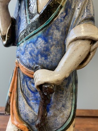 A large Chinese polychrome Shiwan pottery figure of Li Tieguai, 19th C.