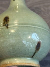 A Chinese russet-splashed Longquan celadon garlic-mouth vase, Yuan/Ming