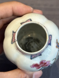 A pair of Chinese famille rose 'antiquities' tea caddies and covers, Yongzheng/Qianlong