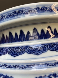 A large Chinese blue and white 'bajixiang' and 'lotus scrolls' tripod censer, Qianlong