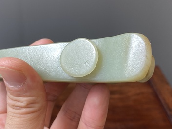 Two Chinese white and celadon jade belt hooks, Qing