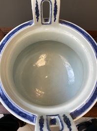A large Chinese blue and white 'bajixiang' and 'lotus scrolls' tripod censer, Qianlong