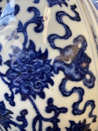 A large Chinese blue and white 'bajixiang' and 'lotus scrolls' tripod censer, Qianlong