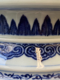 A large Chinese blue and white 'bajixiang' and 'lotus scrolls' tripod censer, Qianlong