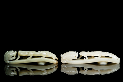 Two Chinese white and celadon jade belt hooks, Qing