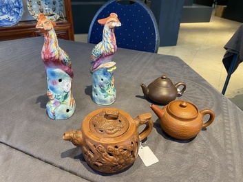 Three Chinese Yixing stoneware teapots and a pair of famille rose phoenixes, 19/20th C.