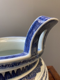 A large Chinese blue and white 'bajixiang' and 'lotus scrolls' tripod censer, Qianlong