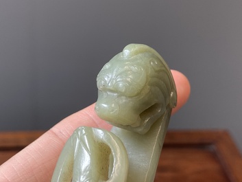 Two Chinese white and celadon jade belt hooks, Qing