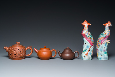 Three Chinese Yixing stoneware teapots and a pair of famille rose phoenixes, 19/20th C.