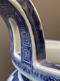 A large Chinese blue and white 'bajixiang' and 'lotus scrolls' tripod censer, Qianlong