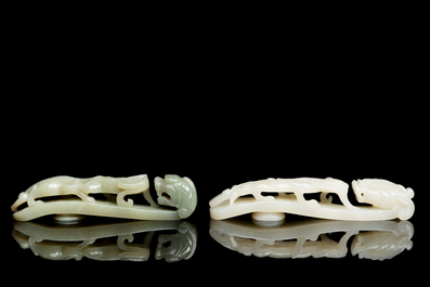 Two Chinese white and celadon jade belt hooks, Qing