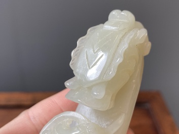 Two Chinese white and celadon jade belt hooks, Qing