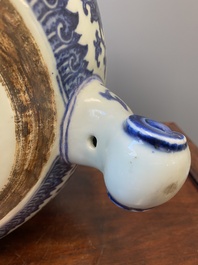 A large Chinese blue and white 'bajixiang' and 'lotus scrolls' tripod censer, Qianlong