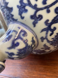 A large Chinese blue and white 'bajixiang' and 'lotus scrolls' tripod censer, Qianlong