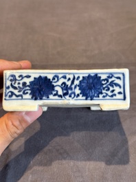 A Chinese blue and white square 'lotus scroll' box and cover, Qianlong